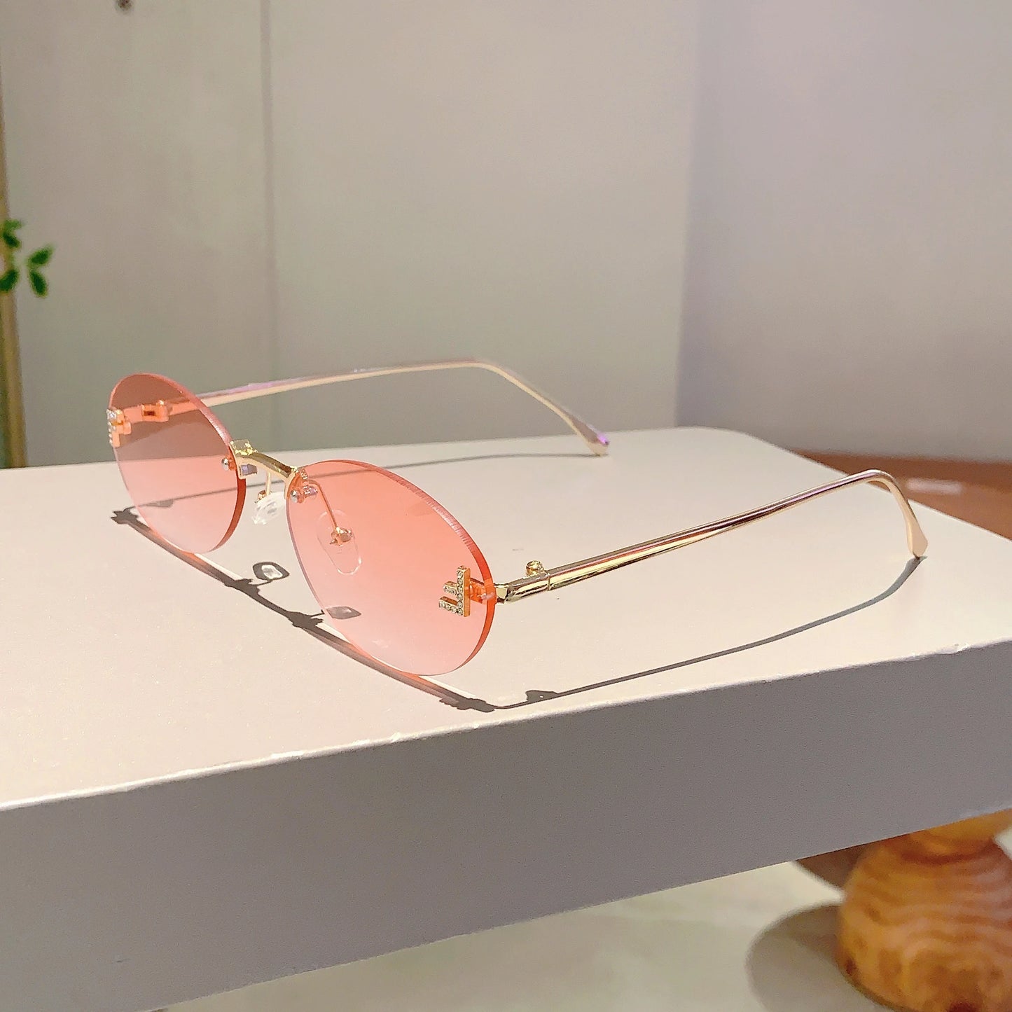 Rose Rimless Oval Sunglasses