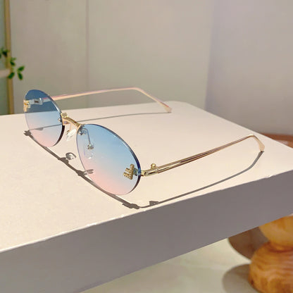 Rose Rimless Oval Sunglasses