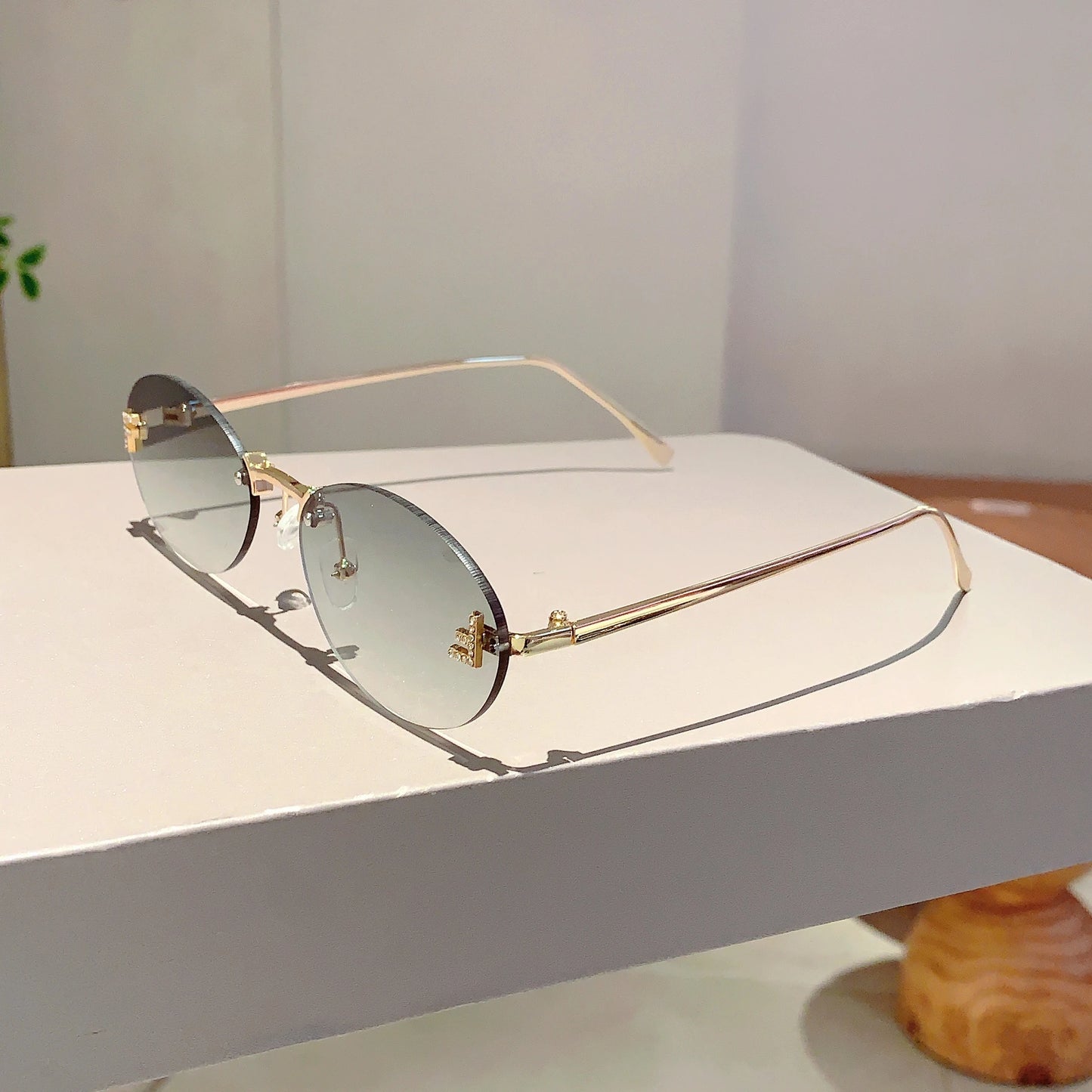 Rose Rimless Oval Sunglasses